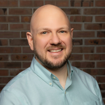Adam W. Riggar headshot. Photo credit: Mark Garvin.