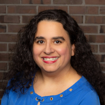 Christina Castro-Tauser headshot. Photo credit: Mark Garvin.