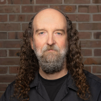 James Cackovich headshot. Photo credit: Mark Garvin.